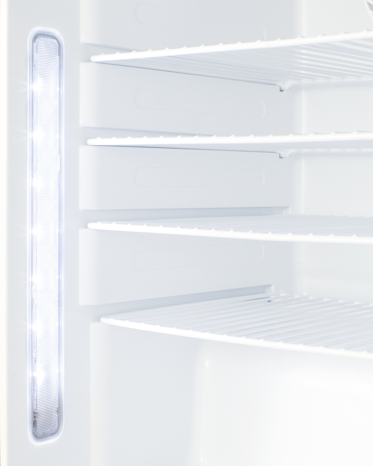 Built-in undercounter ADA compliant +2 C to +8 C all-refrigerator in white with lock, digital controls, wire shelving, hospital cord with 'green dot' plug, factory installed access port, and automatic defrost operation